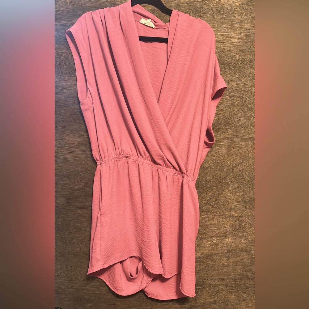 Women’s pink romper , with pockets.